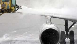 Flights delayed or cancelled due to snowfall in Beijing