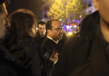 Hollande arrives to visit Bataclan theater in Paris