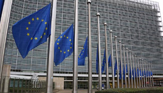 EU flags fly at half mast at EU Headquarters to mourn victims