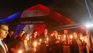 People mourn for victims of Paris attacks in Egypt