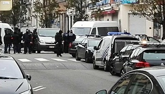 Belgium conducts manhunt in Brussels for Paris attack suspects