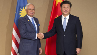 Chinese president meets Malaysian PM in Manila, the Philippines
