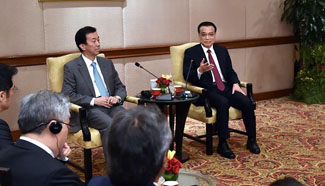 Premier Li meets with representatives of Malaysian business circle