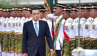 Premier Li attends welcoming ceremony
