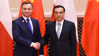 Premier Li meets with Polish president Andrzej Duda
