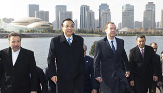 Premier Li, SCO PM meeting participants visit Zhengdong New District