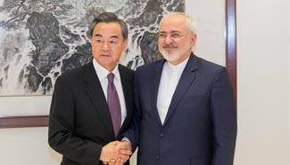 Chinese FM meets his Iraqi and Iranian counterparts in NY