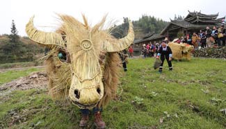 People take part in "spring cattle" dance in S China