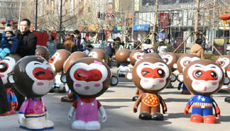 Monkey figurines exhibited outside shopping mall in Jinan