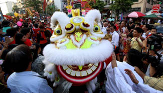 People perform to celebrate Chinese Lunar New Year in Yangon