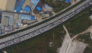 Aerial photos of highway crammed with vehicles in China's Nanning