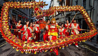 Lion, dragon dancers mark Chinese Lunar New Year in central London