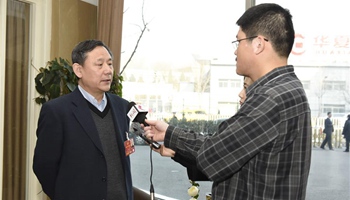 Political advisor for annual session receives interview in Beijing