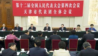 Zhang Gaoli joins group deliberation of NPC deputies from Tianjin