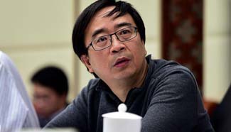 CPPCC member Pan Jianwei attends panel discussion in Beijing
