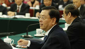 Zhang Dejiang joins group deliberation of NPC deputies from Anhui