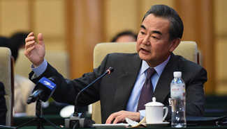 Wang Yi attends plenary meeting of NPC deputies from Zhejiang