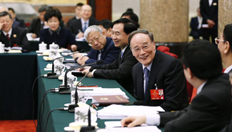 Wang Qishan joins group deliberation of NPC deputies from Liaoning Province
