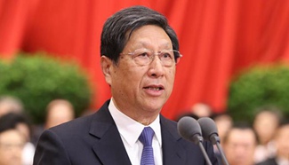 Zhang Ping presides over 2nd plenary meeting of 4th session of 12th NPC