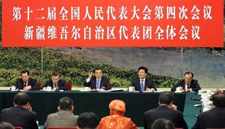 Premier Li joins group deliberation of deputies of China's Xinjiang