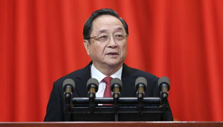 Top political advisor delivers report on work of CPPCC National Committee's Standing Committee