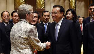 Premier Li underscores global cooperation while meeting entrepreneurs at Boao
