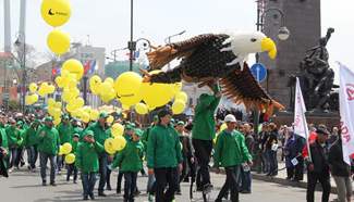 People take part in parade to mark Labour Day in Vladivostok