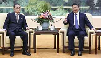 President Xi meets DPRK delegation