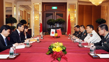 China urges Japan not to intervene in, hype up South China Sea issue