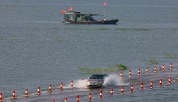 Road submerged in Poyang Lake due to continuous rain in China's Jiangxi