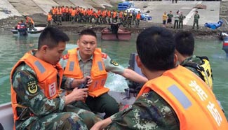Firefighters search for missing people after ship capsizing in SW China