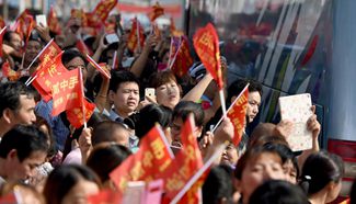 Shuttle buses carry students for upcoming "gaokao" in China's Anhui