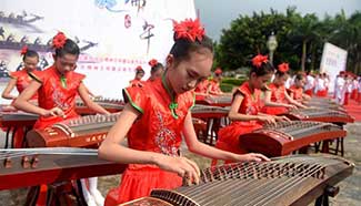 Pupils take part in event to celebrate Dragon Boat Festival in S China