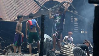 Around 100 Philippino families lose homes in fire