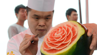 Watermelon eating competition attracts visitors, participants
