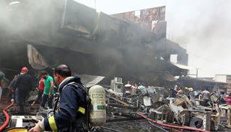 23 killed in two suicide bomb attacks in Iraq's Baghdad