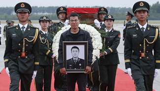 Chinese peacekeeper's body brought home from Mali