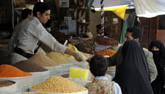 Yemeni people shop during Ramadan in Sanaa