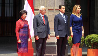 Mexico's president welcomes visiting Singapore President