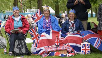 People celebrate Queen Elizabeth II's official 90th birthday in London