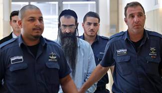 Yishai Schlissel arrives in district court to attend hearing in Jerusalem