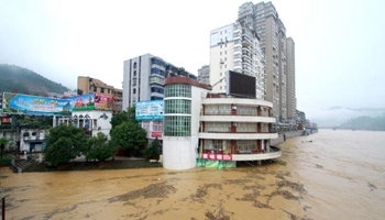 Torrential railfall causes flood water in SE China's county