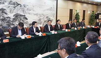 Zhang Zhijun meets Kuomintang Party youth-wing delegation in Beijing