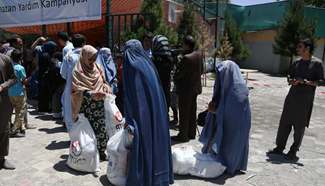 Afghan-Turk school donates relief goods to poor families in Kabul during Ramdan