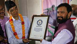 Nepalese man performs yoga over 50 hours to break Guinness record