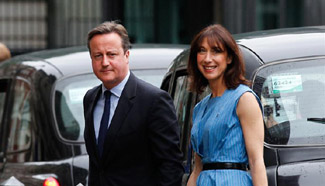 Britain's PM and wife cast votes for EU Referendum in London