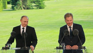 Putin visits Finland, discusses NATO issues