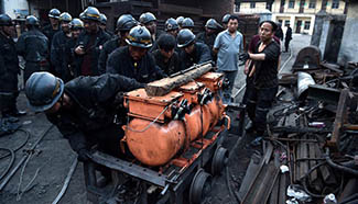 Twelve miners trapped in Shanxi flooded mine