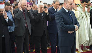 Palestinian president attends Eid Al-Fitr prayer