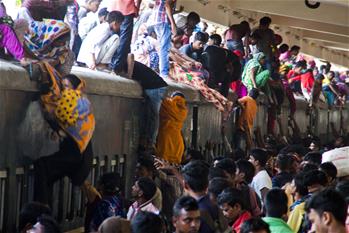 Bangladeshi people return to Dhaka by train after Eid al-Fitr festival